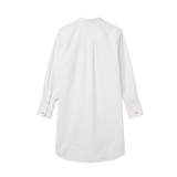 A white long-sleeve button-up tunic dress with a relaxed fit.